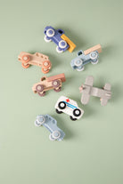 Set of silicone toy vehicles shown against a plain white background