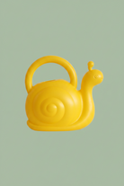 A bright yellow watering can-shaped be with a loop handle and a snail design, shown on a plain white background.