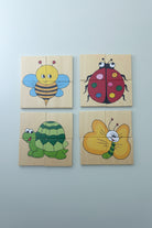 wooden block puzzle 4 puzzles of 4 pieces each in a wooden box