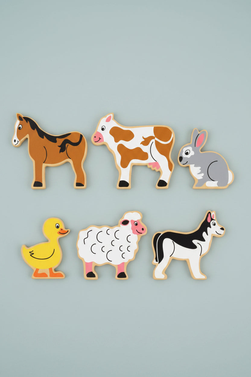 Six farm animal wooden on a blue background: a brown horse, a brown-and-white cow, a gray rabbit, a yellow duck, a white sheep, and a black-and-white dog.