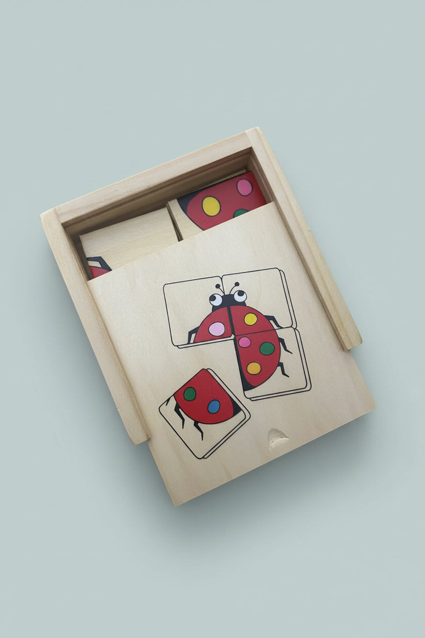 Wooden puzzle with ladybug design on a wooden surface