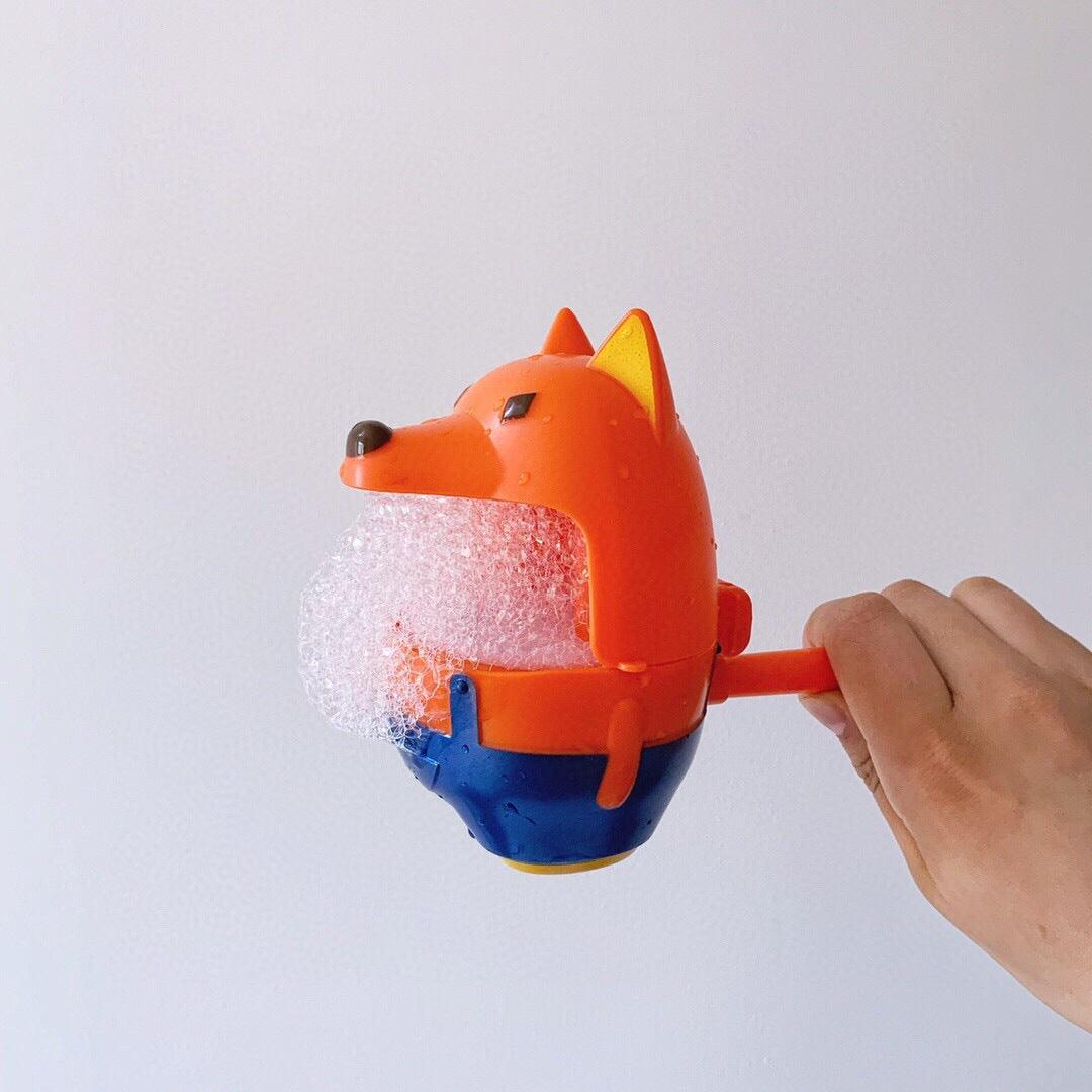 Kids bubble whistle creating floating bubbles